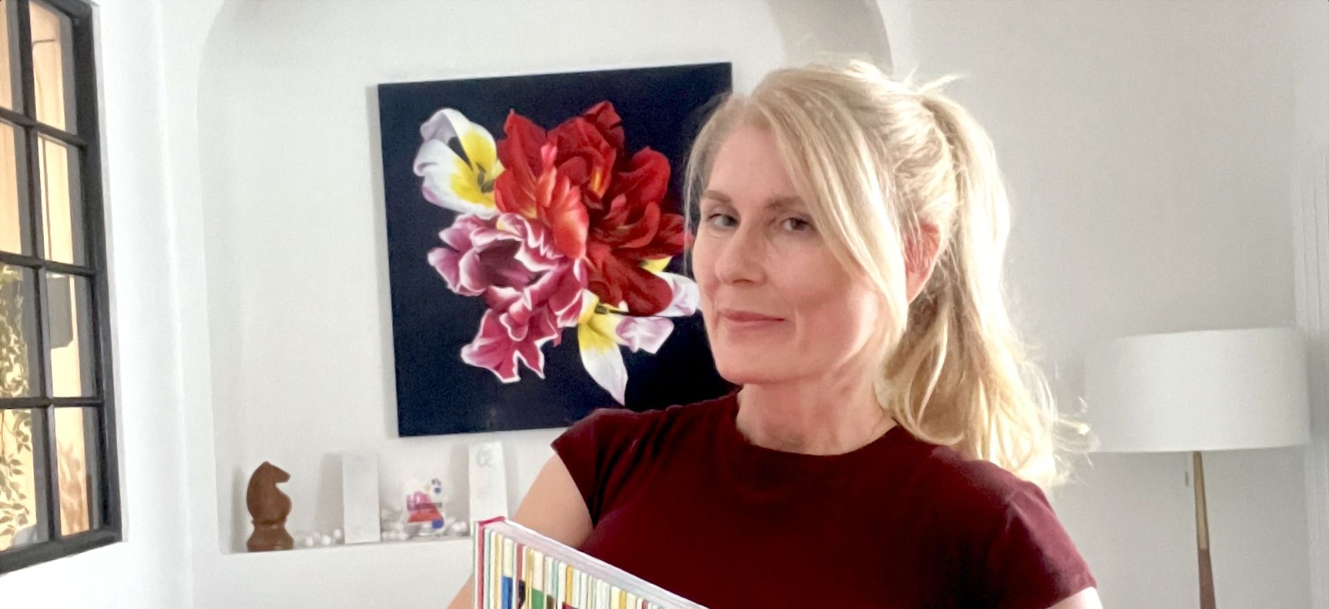 Lisa Sheehan holding book "I've Got It Covered"