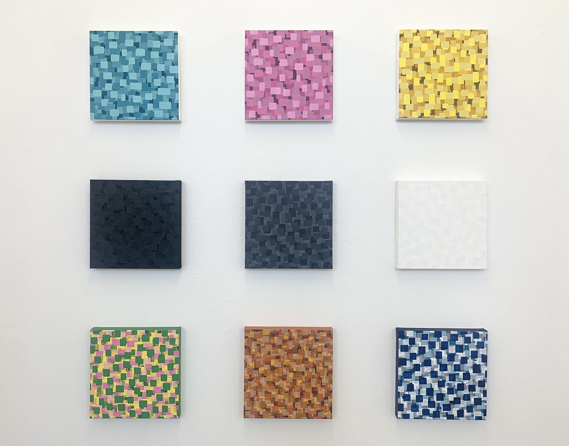 An image of 9 colourful tiles