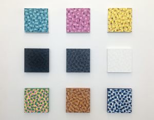 An image of 9 colourful tiles