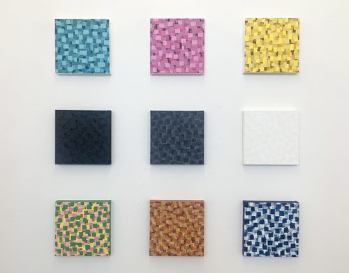 An image of 9 colourful tiles