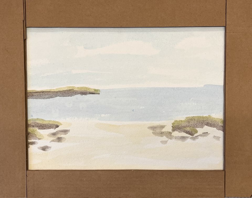 Painting of beach in cardboard frame