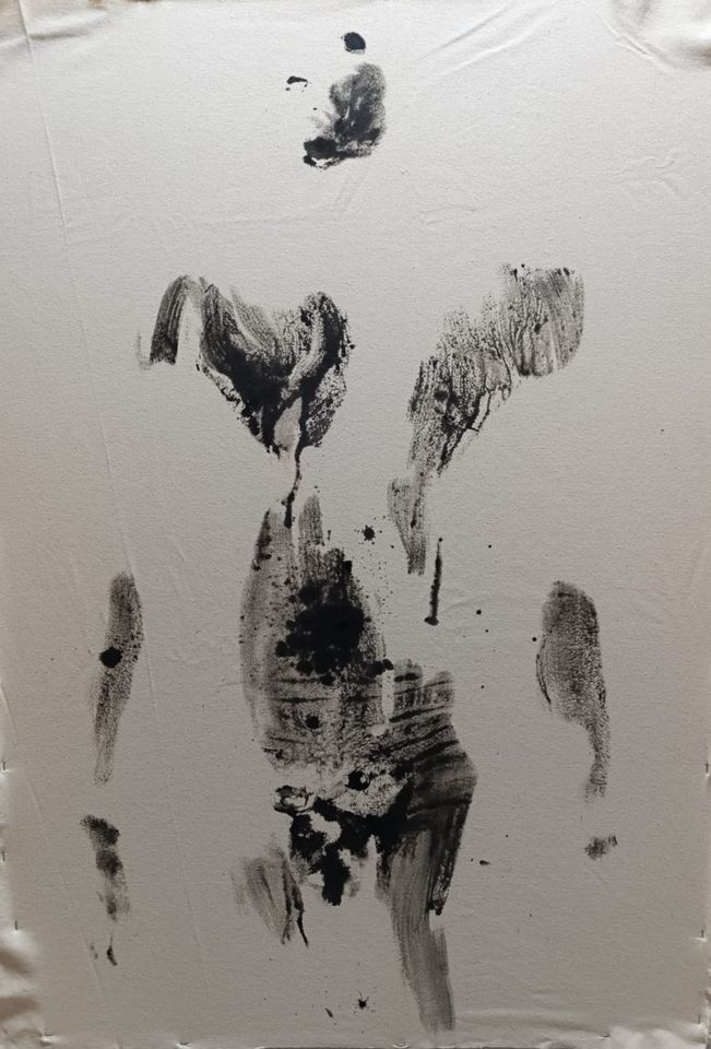 Abstract painting of black smears that form the shape of a woman