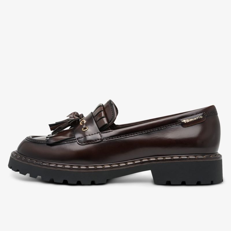 Brauner Loafer mit einer klobigen schwarzen Sohle, Zierquasten und goldenen Beschlägen.
