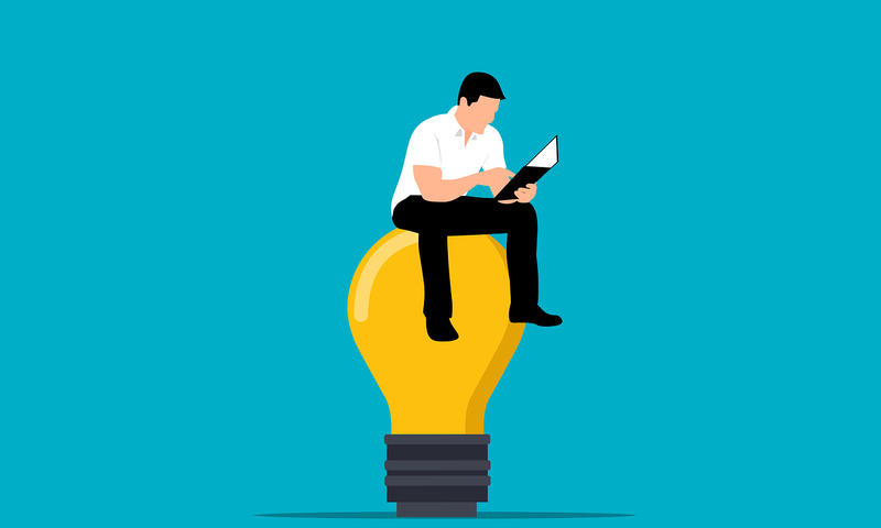 Illustration of a man sitting on a light bulb.