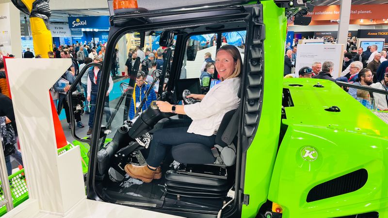 Frau Plehn in the exhibition vehicle