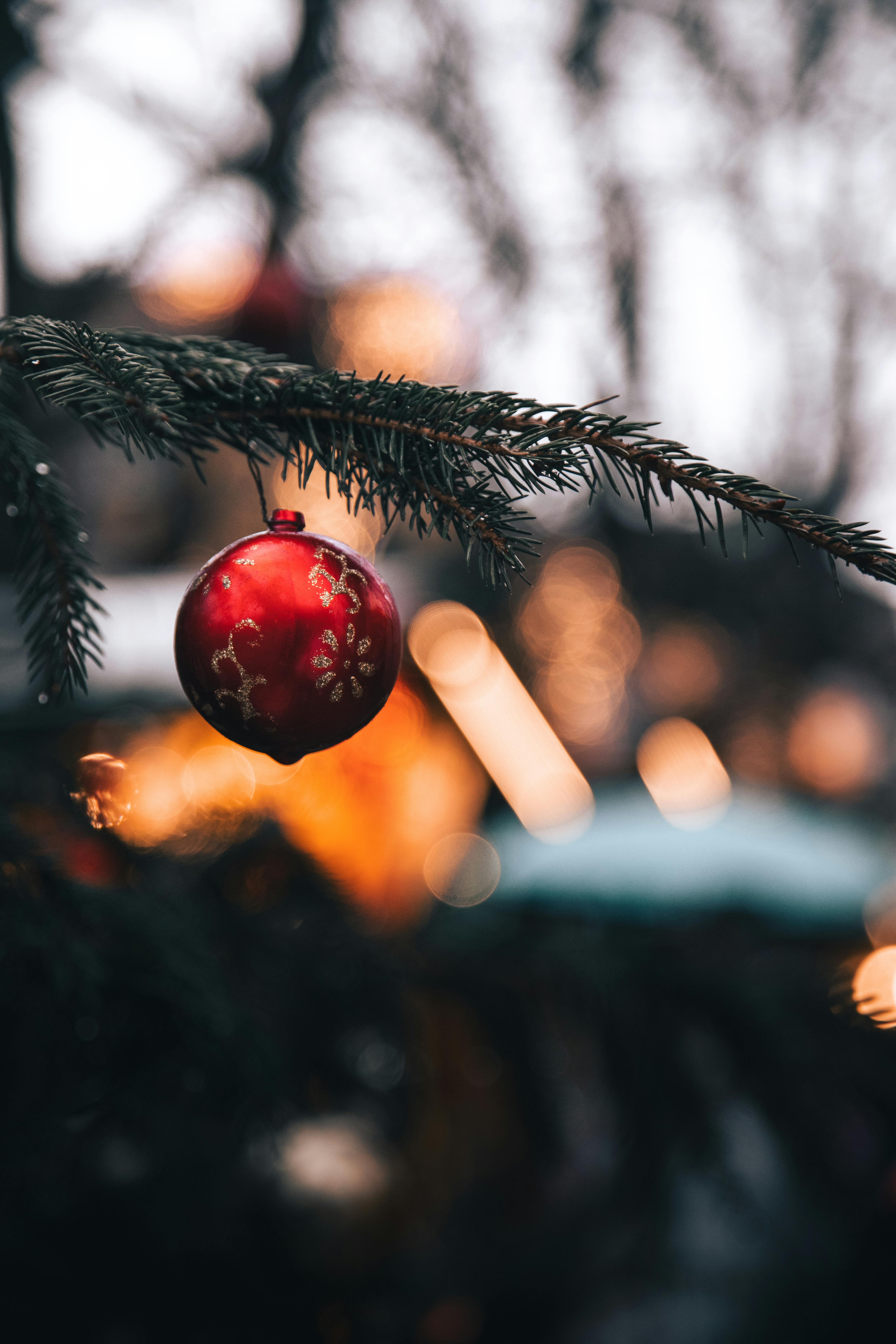 A bauble in the foreground with a blurred background