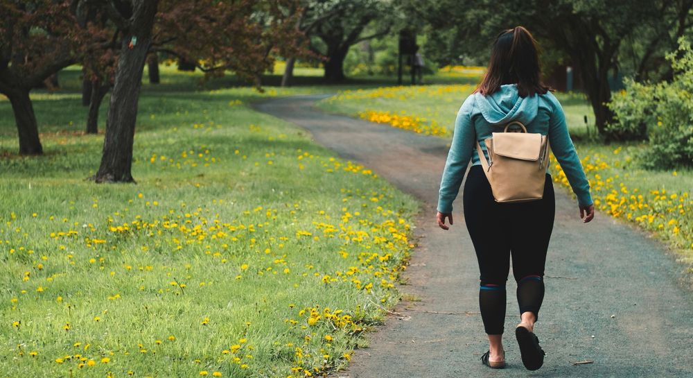 Woman walking in the park.
