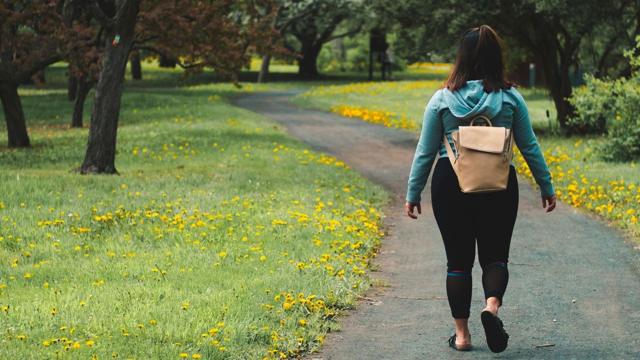 Woman walking in the park.