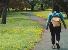 Woman walking in the park.