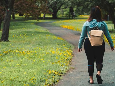 Woman walking in the park.