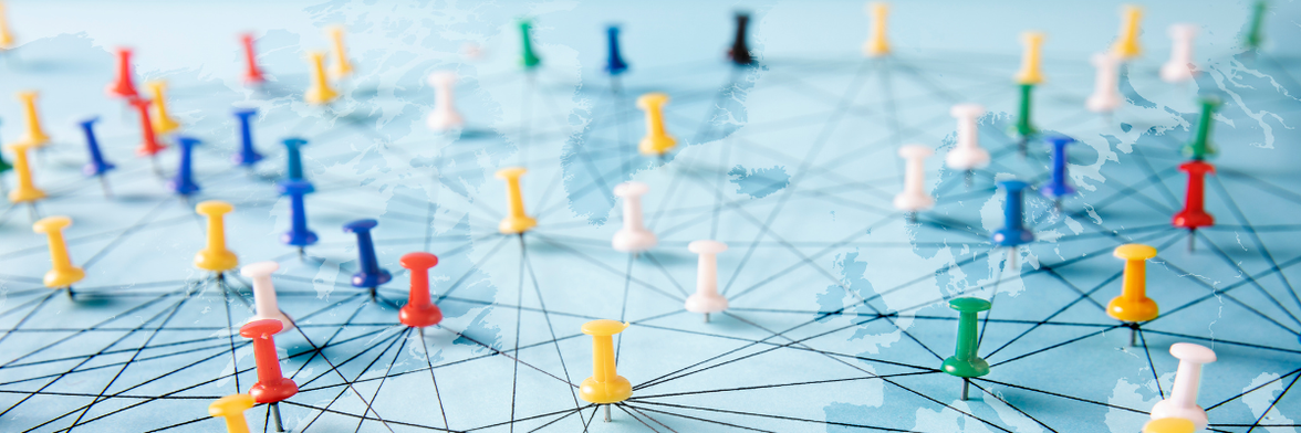 Colored pins connected by lines on a map, symbolizing enterprise intranet and digital networks.