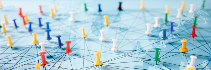 Colored pins connected by lines on a map, symbolizing enterprise intranet and digital networks.