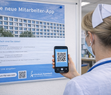 Nurse scans QR code from poster for new employee app, Klinikum Kulmbach.