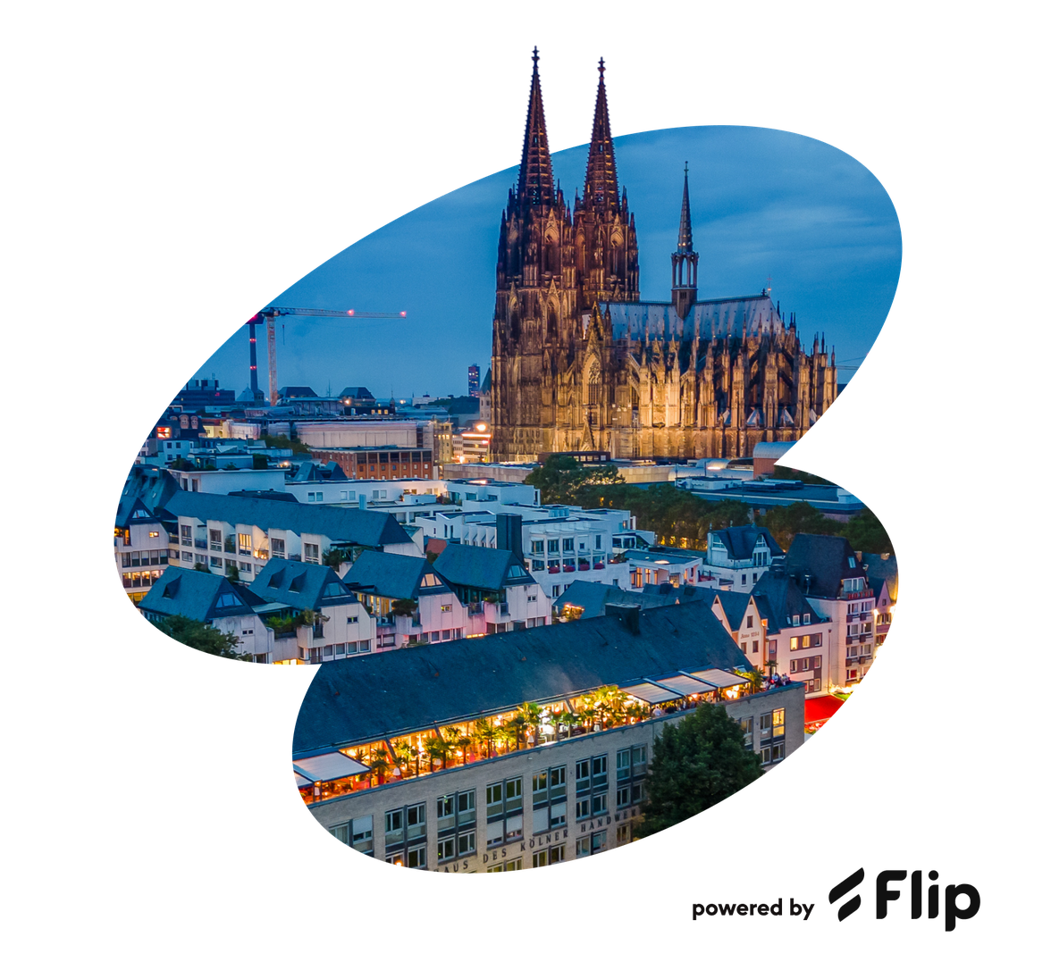 Cologne Cathedral at dusk, cityscape, powered by Flip branding in corner, no UI visible.
