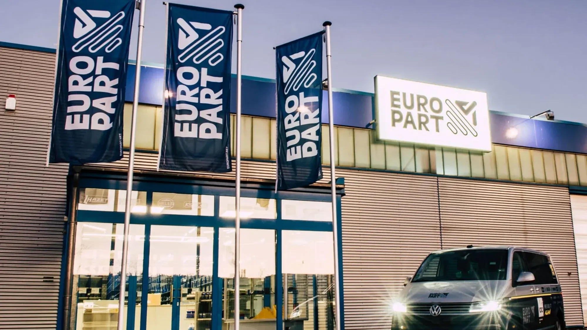 EUROPART building exterior with flags and van