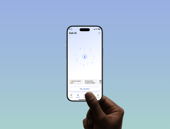 Hand holding smartphone with Flip app Ask AI feature visible.