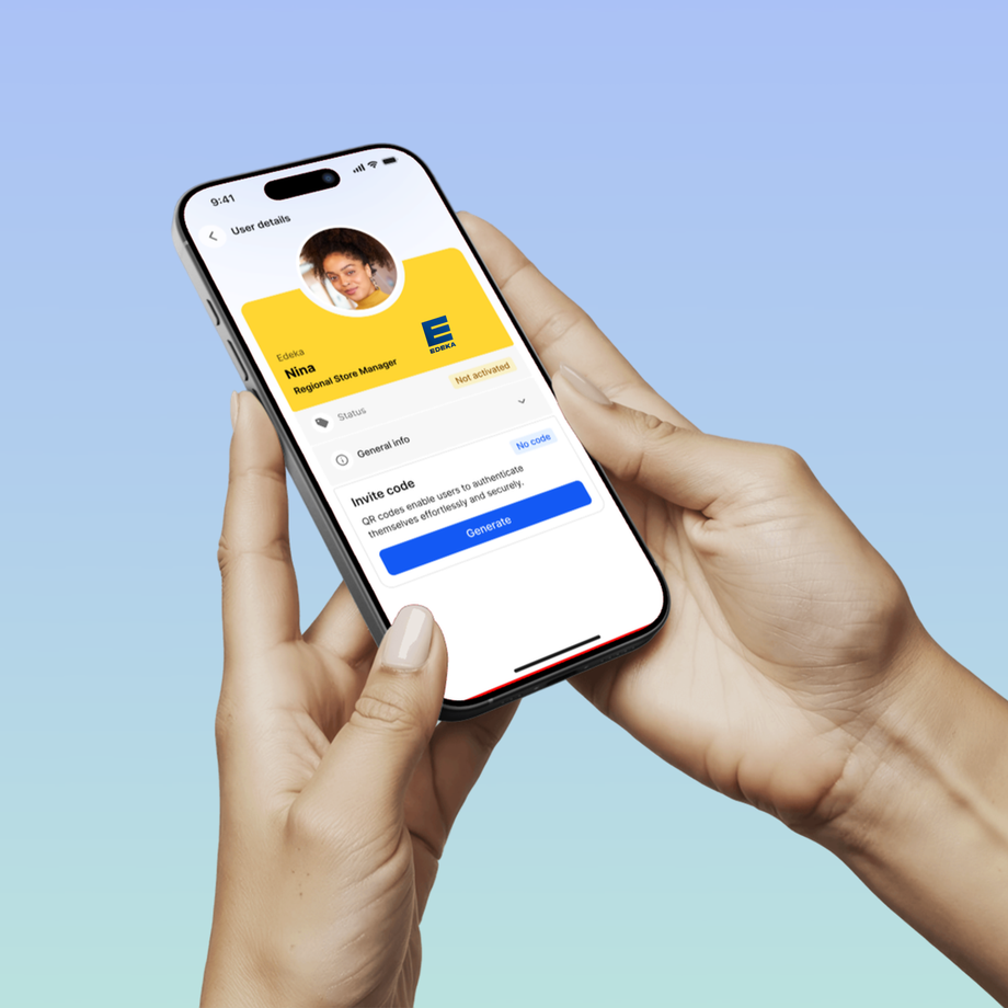 Hands holding phone with app showing user details for Nima, Regional Store Manager.