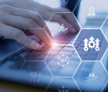 Hand typing on laptop with digital icons for Employee Experience Platform, HR-Portal, Agentic AI.