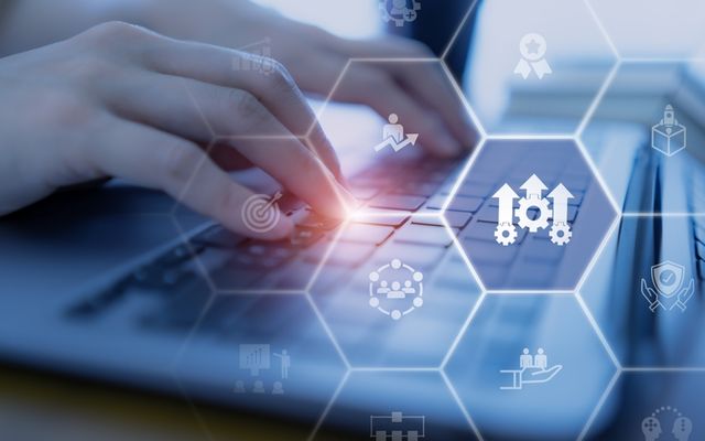 Hand typing on laptop with digital icons for Employee Experience Platform, HR-Portal, Agentic AI.