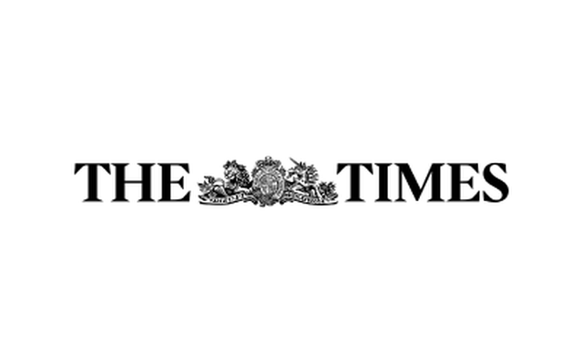 The Times logo with decorative emblem.