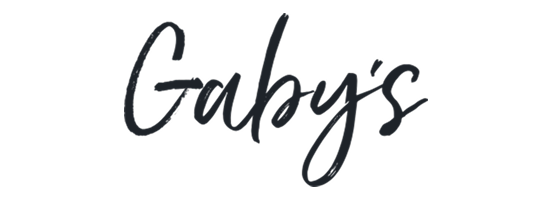 The image shows the word "Gaby's" written in a cursive, black font on a white background.