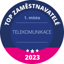 Round badge with "Top Zaměstnavatelé 2023" in Czech, "1. místo" and "Telekomunikace" in the center, and three stars below.