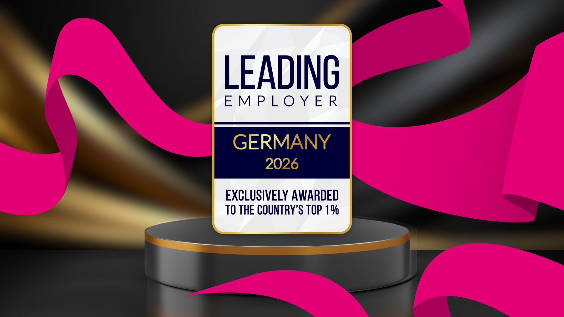 Award plaque for "Leading Employer Germany 2026" on a black base with pink and gold ribbons in the background.