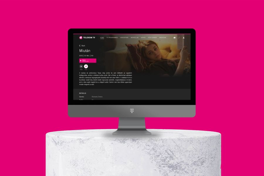 Computer monitor displaying a TV show interface with a pink background.