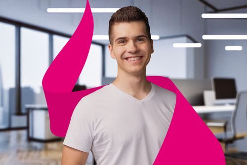 Smiling person in a white shirt with a magenta ribbon-like graphic in a modern office setting.