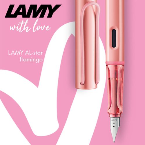LAMY AL-star flamingo fountain pen on a pink heart background with "LAMY with love" text.