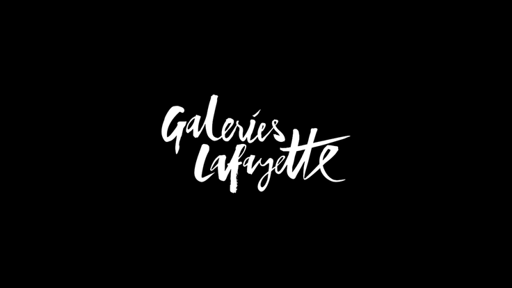 Stylized white script text "Galeries Lafayette" on a black background.