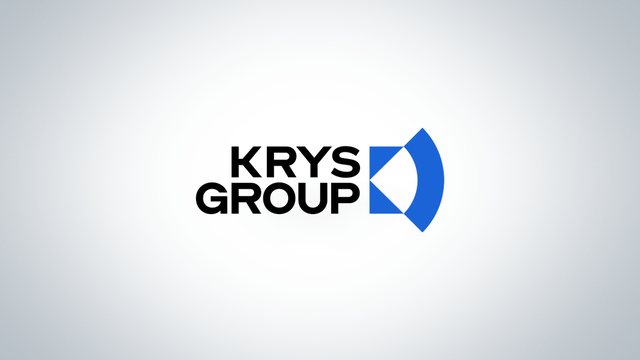 "KRYS GROUP" text with a blue geometric logo on a white background.