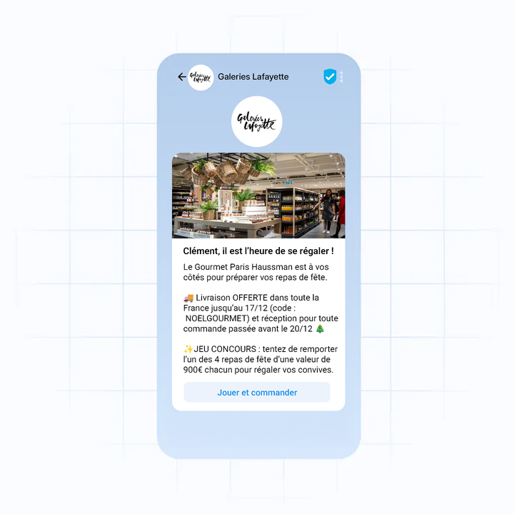 A smartphone screen displays a Galeries Lafayette app with a festive promotion for gourmet meals and free delivery in France, plus a contest announcement.