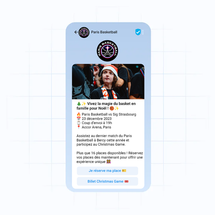 A smartphone screen displaying a Paris Basketball event invitation for a Christmas game on December 23, 2023, at Accor Arena, Paris.