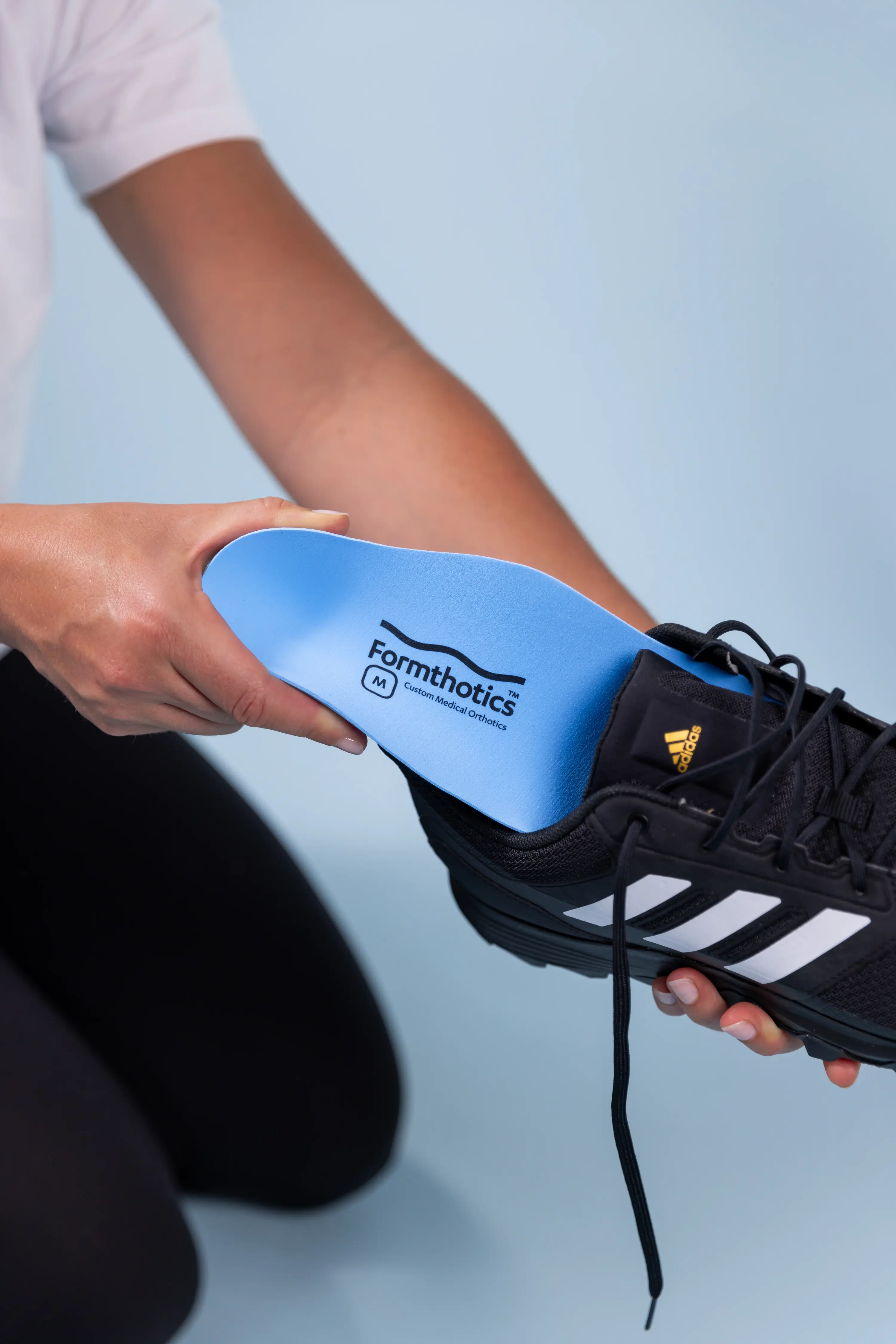 Formthotics into shoe