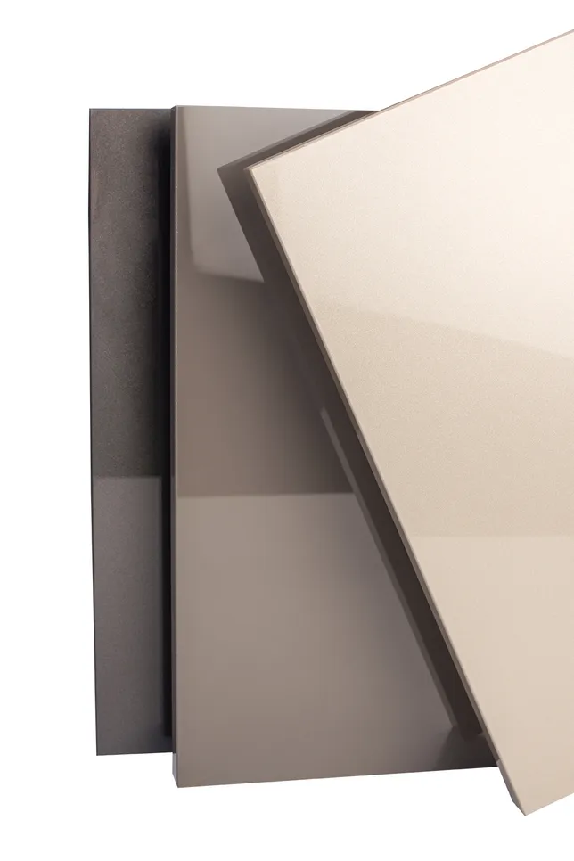 Close-up of three overlapping, glossy panels in three different colours.