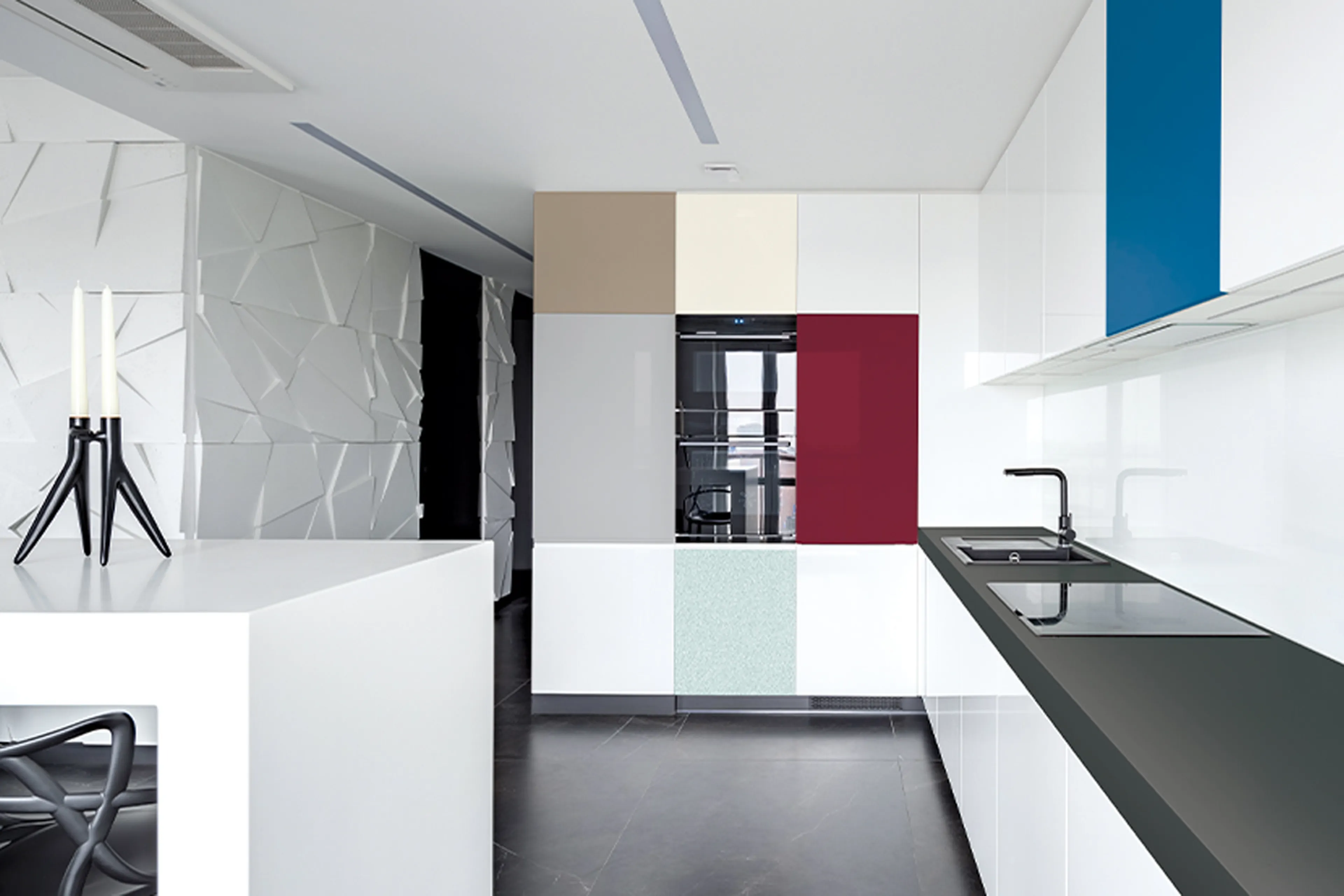 Modern kitchen with cabinets in various colors made out of senosan sheets.