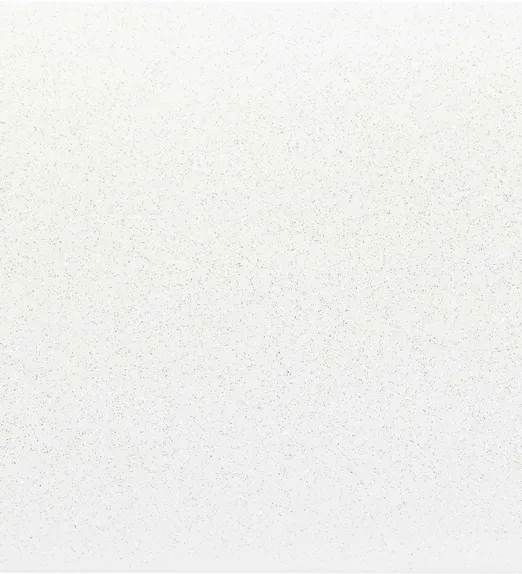 A close-up of a white surface with subtle speckled texture throughout, resembling a lightly sprinkled pattern.