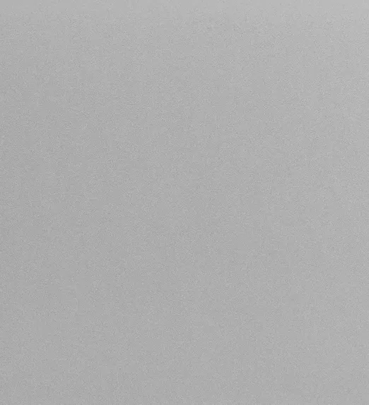 Plain gray textured surface with a fine granular pattern, evenly distributed across the image.