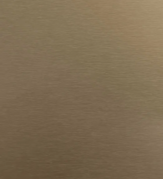 Brushed metal surface with a warm, golden-brown hue, displaying fine lines and a subtle sheen diagonally across.