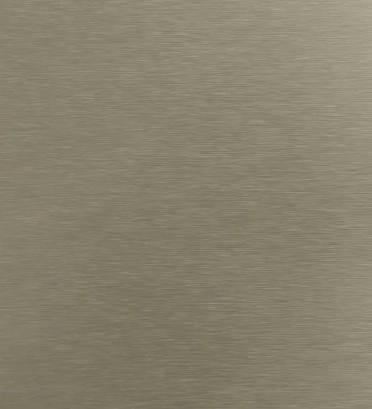 Brushed metallic surface with a smooth texture and subtle horizontal lines, reflecting light in a soft, muted golden hue.