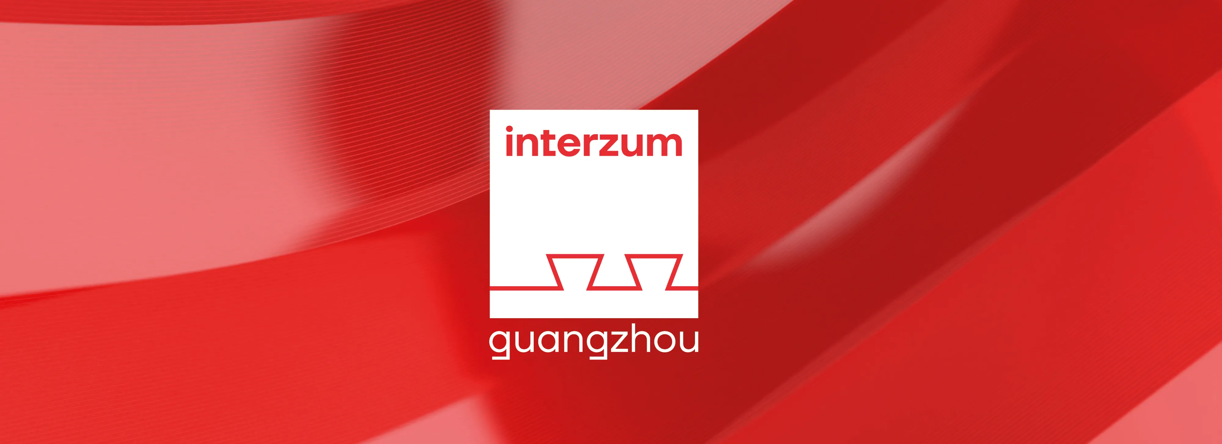 Logo for Interzum Guangzhou with red background, featuring bold red text and geometric shapes in white.