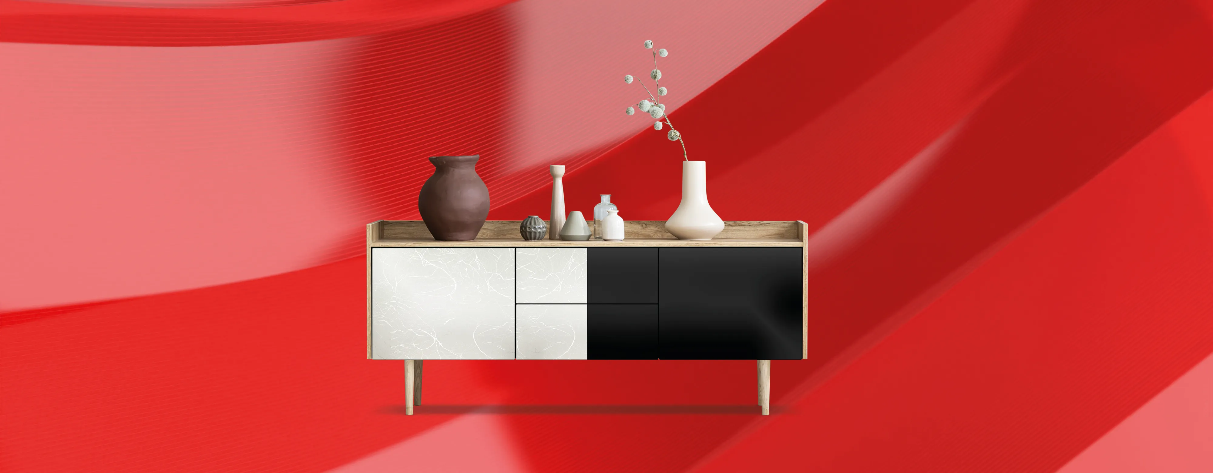 Modern sideboard with vases and decor on top, set against a vibrant red abstract background.