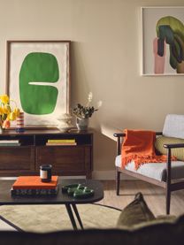 "Stylish living room with modern art and comfortable seating in Way of Life luxury apartment rentals featuring co-working spaces." [G]