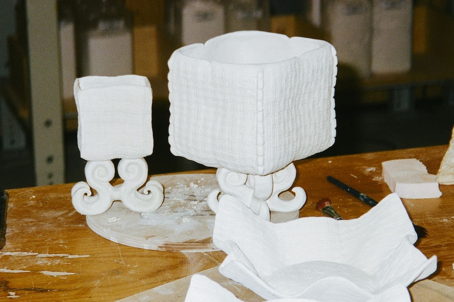 Ceramics project on table and white clay