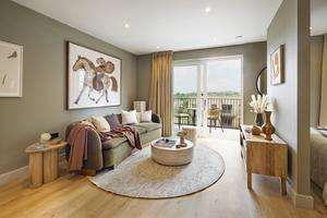 "Elegant living room with balcony view in Way of Life luxury apartment rentals, featuring stylish decor and natural light." [G]