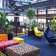 An open office environment with cozy-looking, colorful furniture