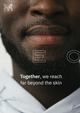 Close-up of a man with a beard, wearing a light shirt. Text: "Together, we reach far beyond the skin." Logo of a stylized lion at the top