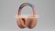 A video loop of headphones rotating, with a prompt to adjust the surface to different materials – as the prompt changes, the material on the headphones changes