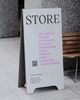 A standing sign for the shop at a design school